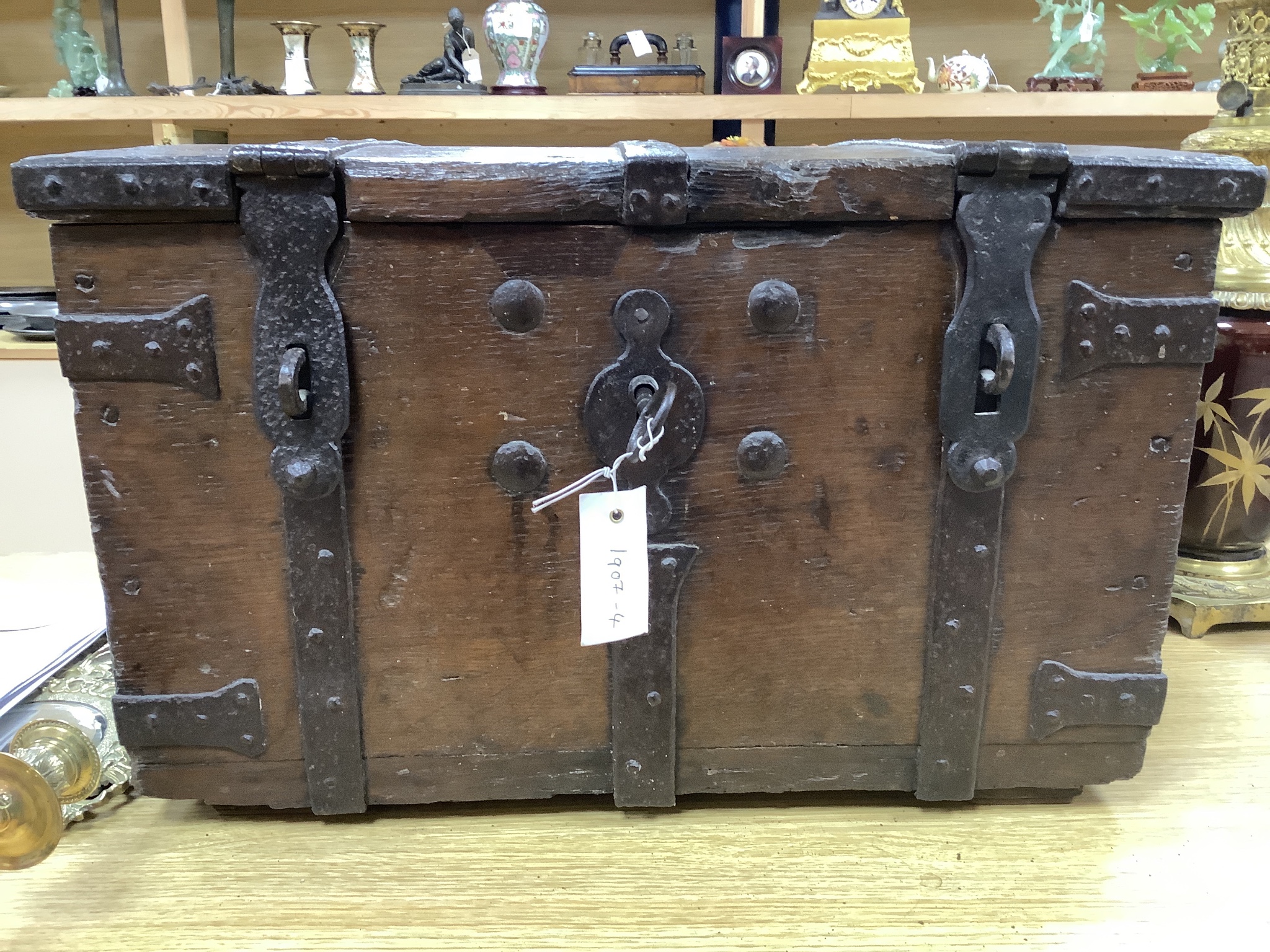 A 17th/18th century iron bound oak strong box, 60cm wide, 36cm deep, 35.5cm high